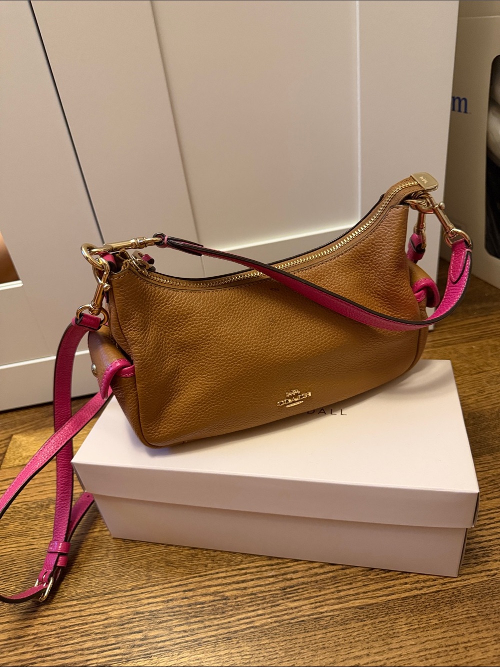 Coach Pebbled Leather Shoulder Bag in Brown with Pink Strap